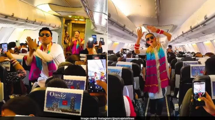 হোলির সময় ফ্লাইটে স্পাইসজেট কর্মীরা একটি প্রথাগত নাচের সাথে হোলি উদযাপন করলেন!